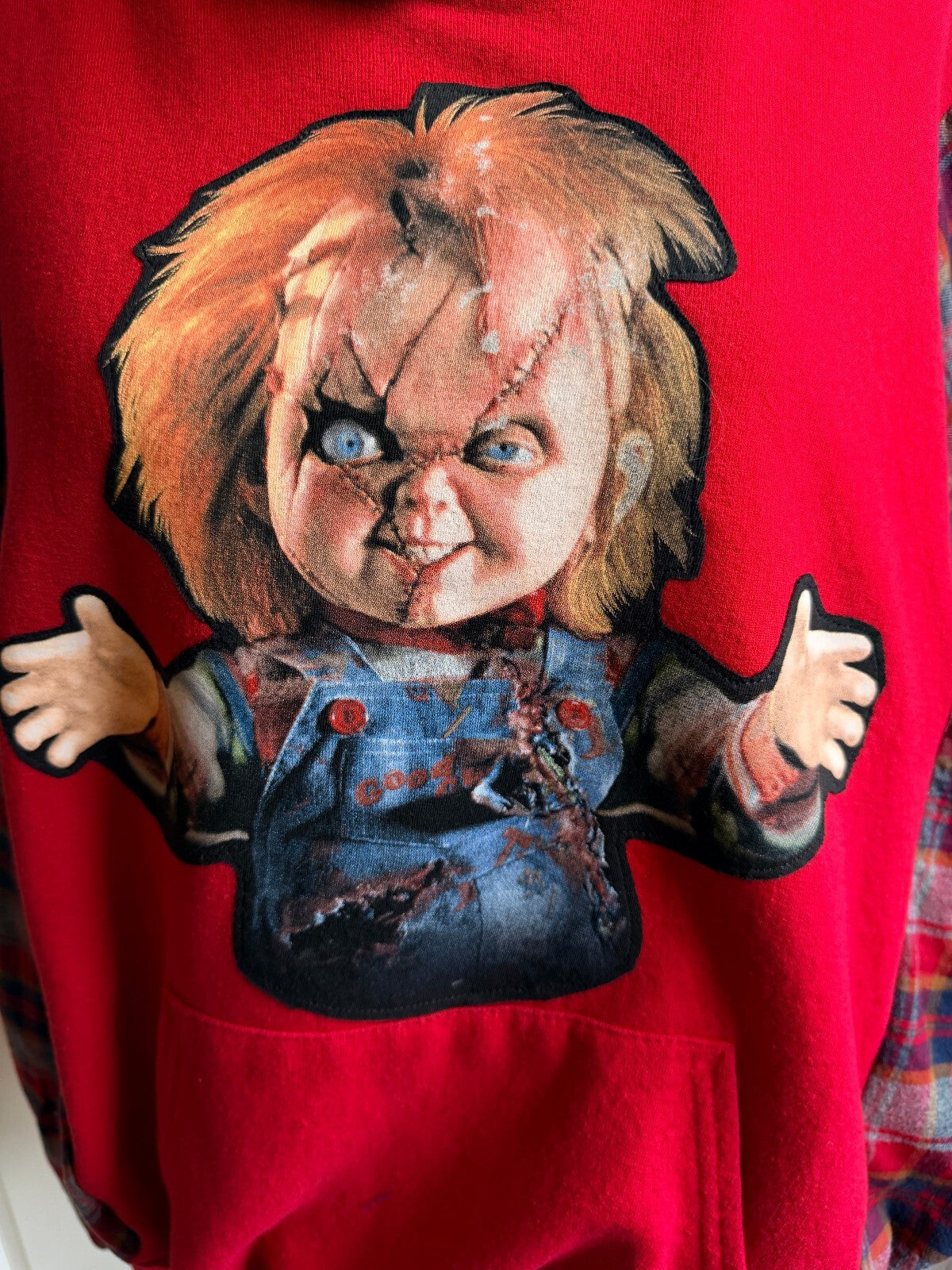 Red Hoodie with Chucky Graphic and Plaid Sleeves, Medium