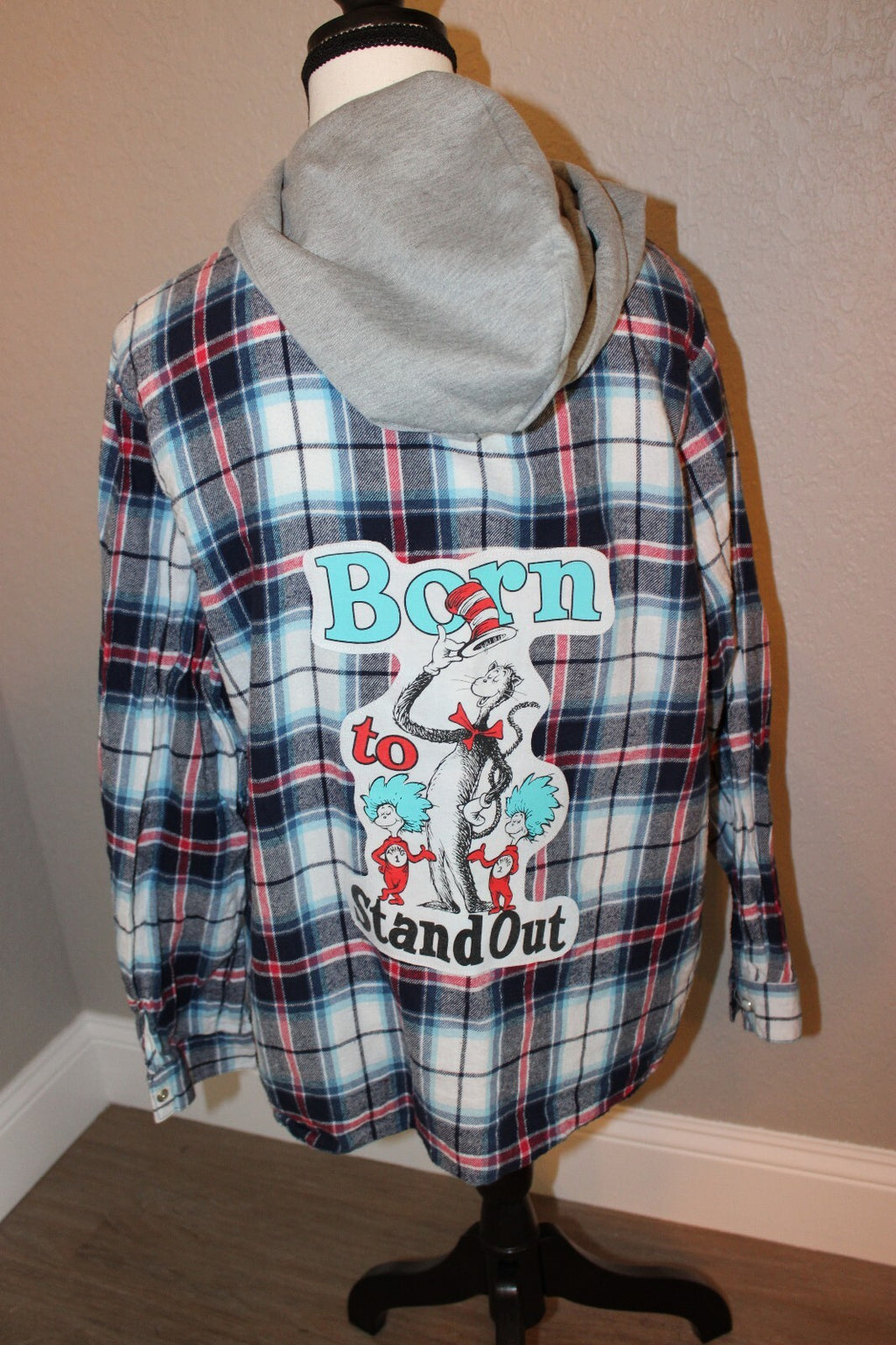 Dr. Seuss Inspired Plaid Flannel Shirt with Hood and 'Born to Stand Out' Graphic Medium