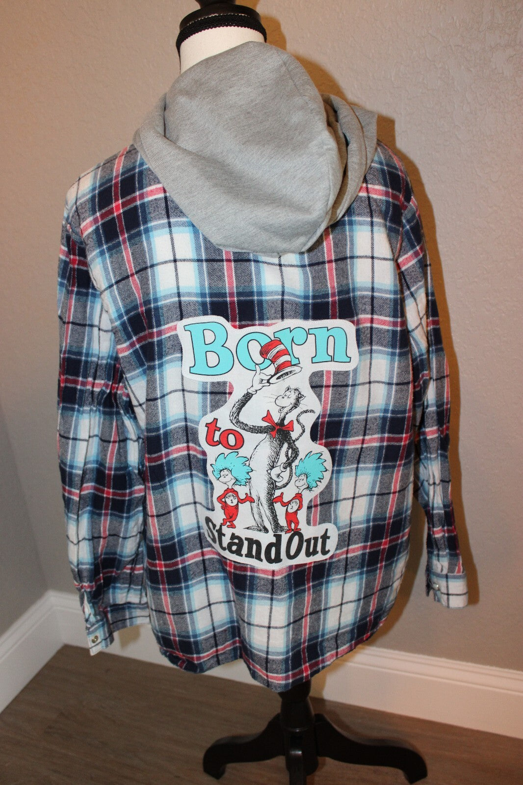 Dr. Seuss Inspired Plaid Flannel Shirt with Hood and 'Born to Stand Out' Graphic Medium